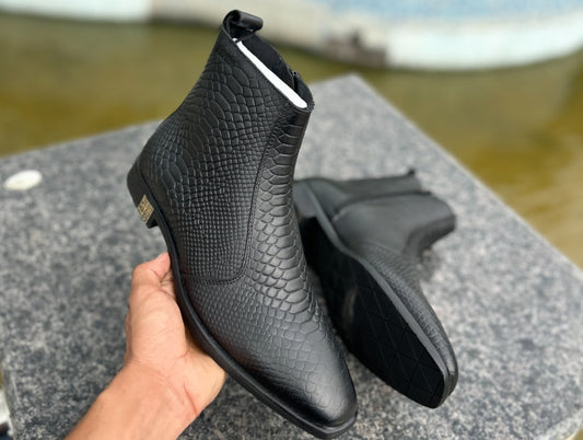 Scaled snakeskin pointed leather boots